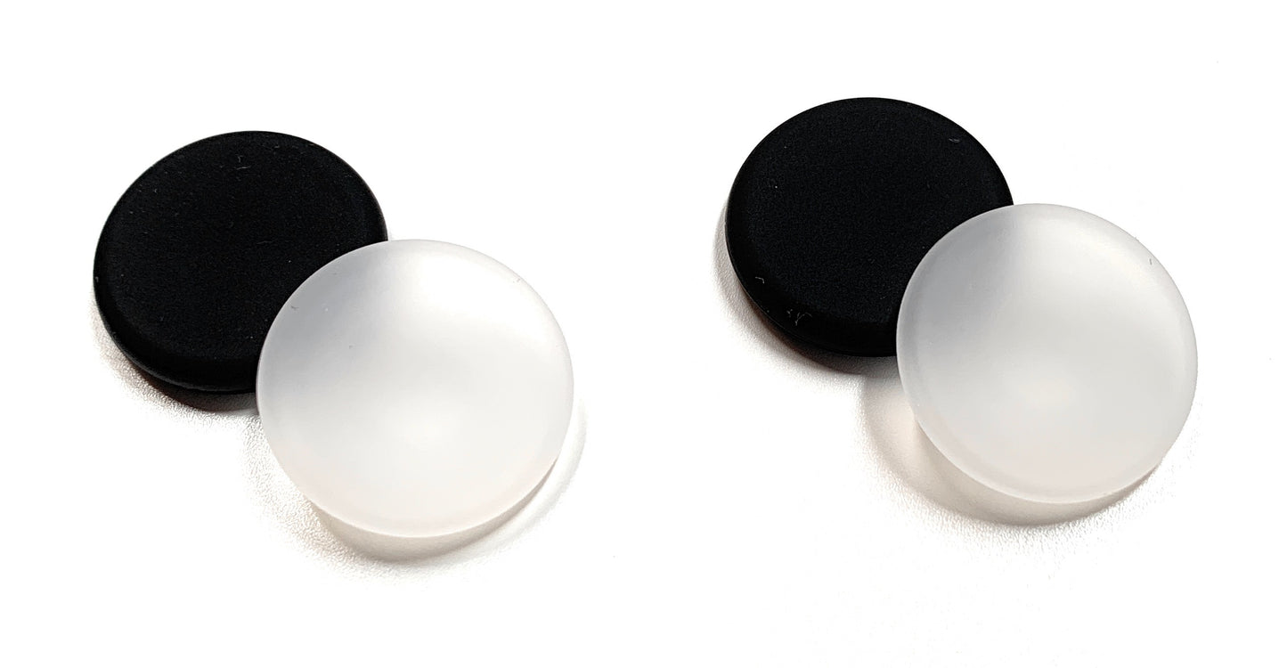 Couvre-boutons (paquet de 4 noirs et transparents)